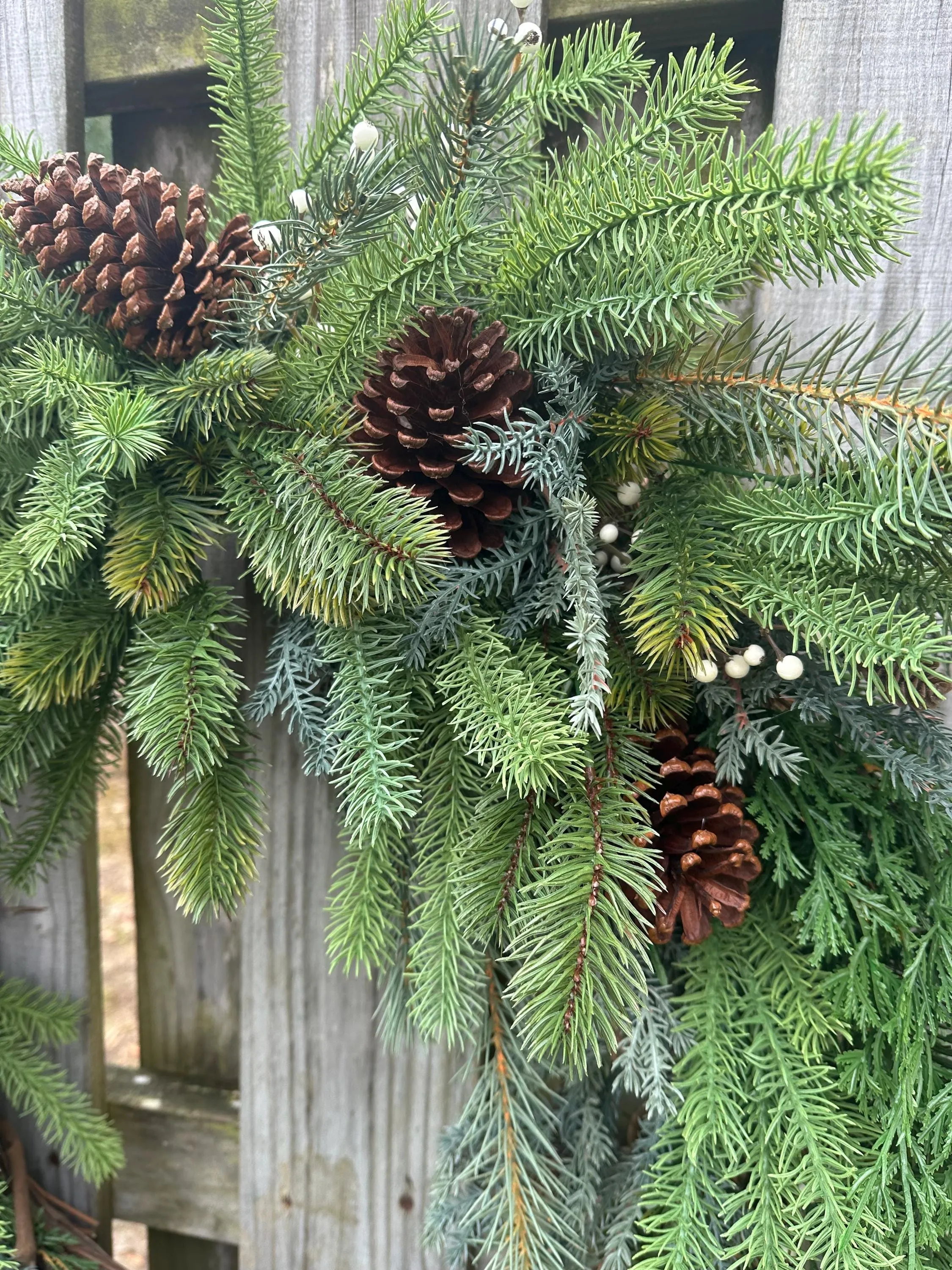 Cascading Winter Pine Wreath with Berries and Pinecones