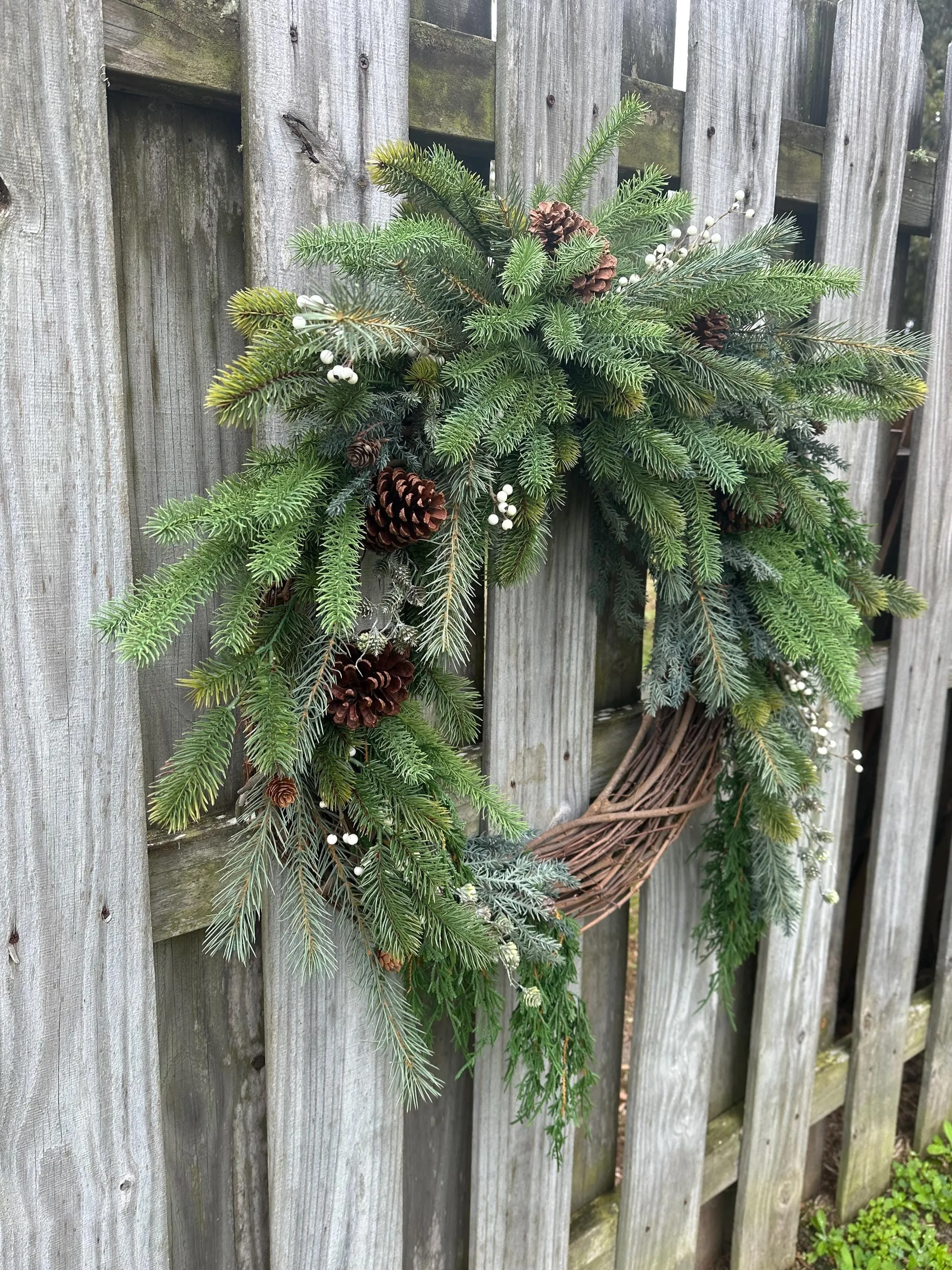 Cascading Winter Pine Wreath with Berries and Pinecones