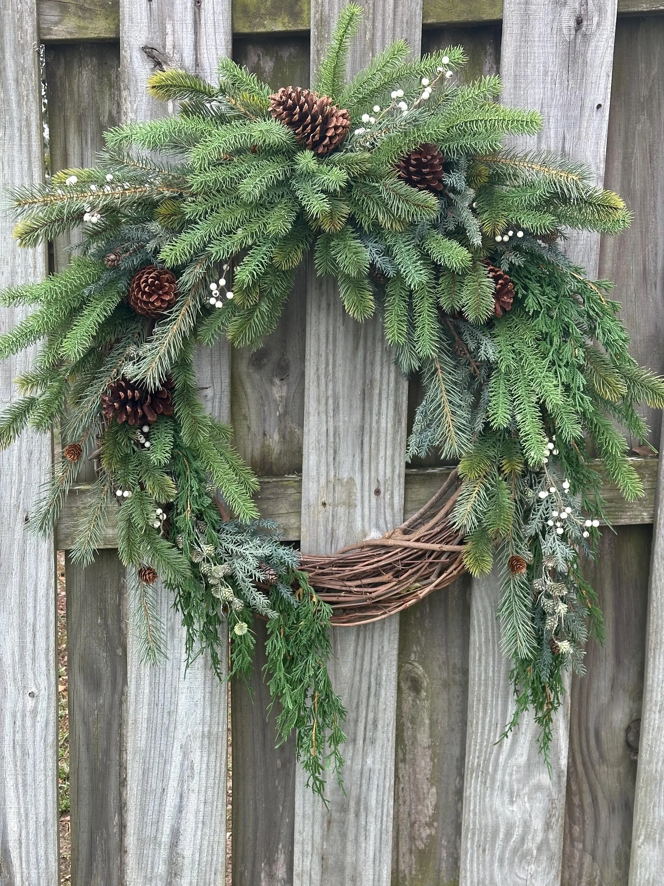 Cascading Winter Pine Wreath with Berries and Pinecones